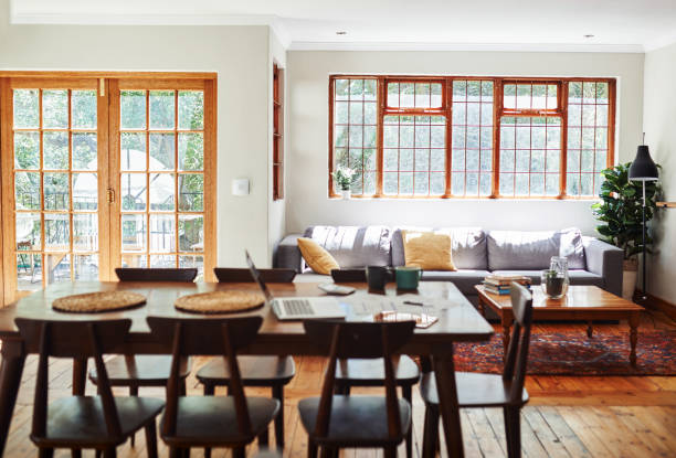 Still life shot of a living room area inside a modern house Worker inspecting construction materials.